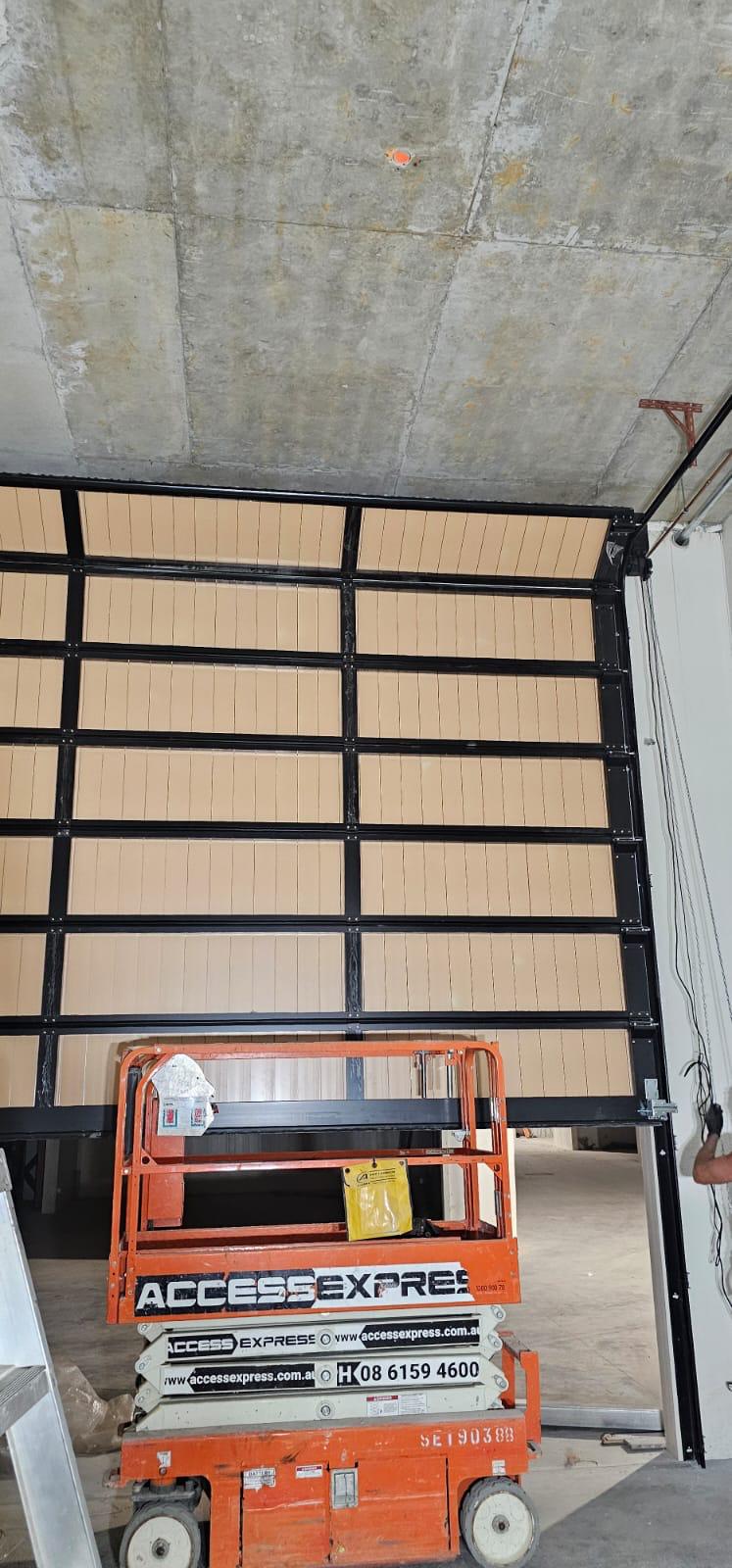 Garage door maintenance technician